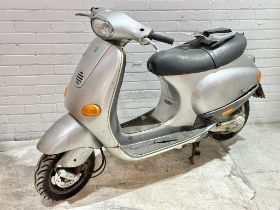 A Piaggio 50, with Documents.