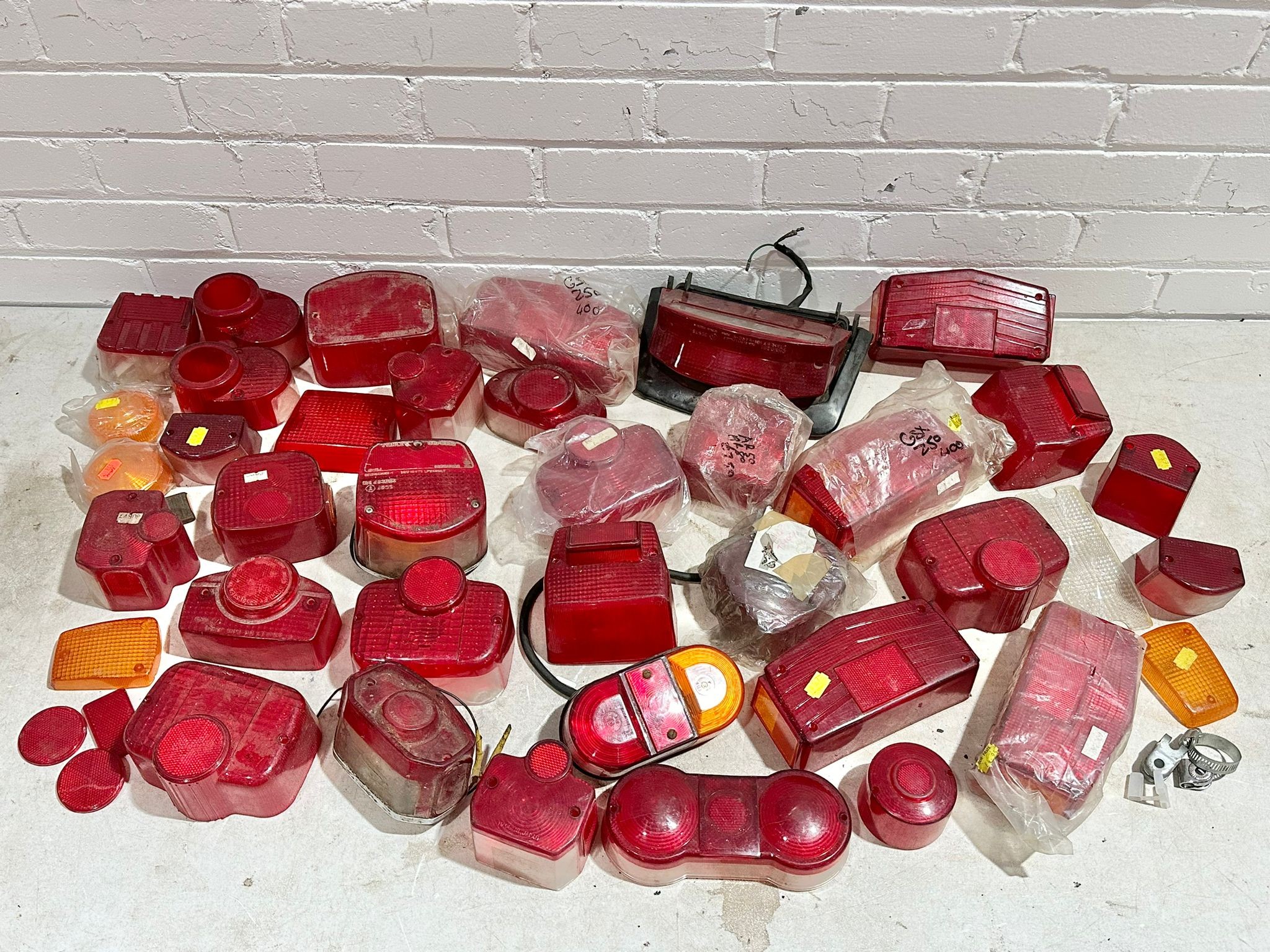 A quantity of motorbike tail lights