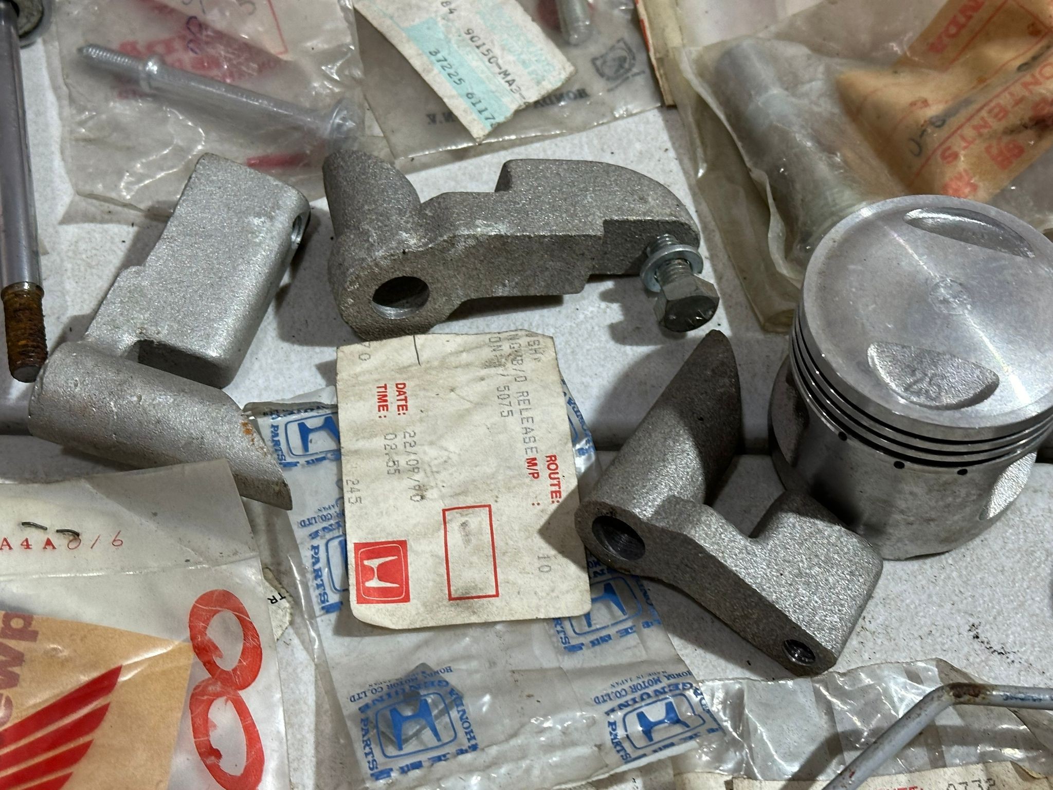 A large quantity of mostly old new stock genuine Honda parts. - Image 32 of 65