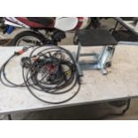 Motorbike stand with cables