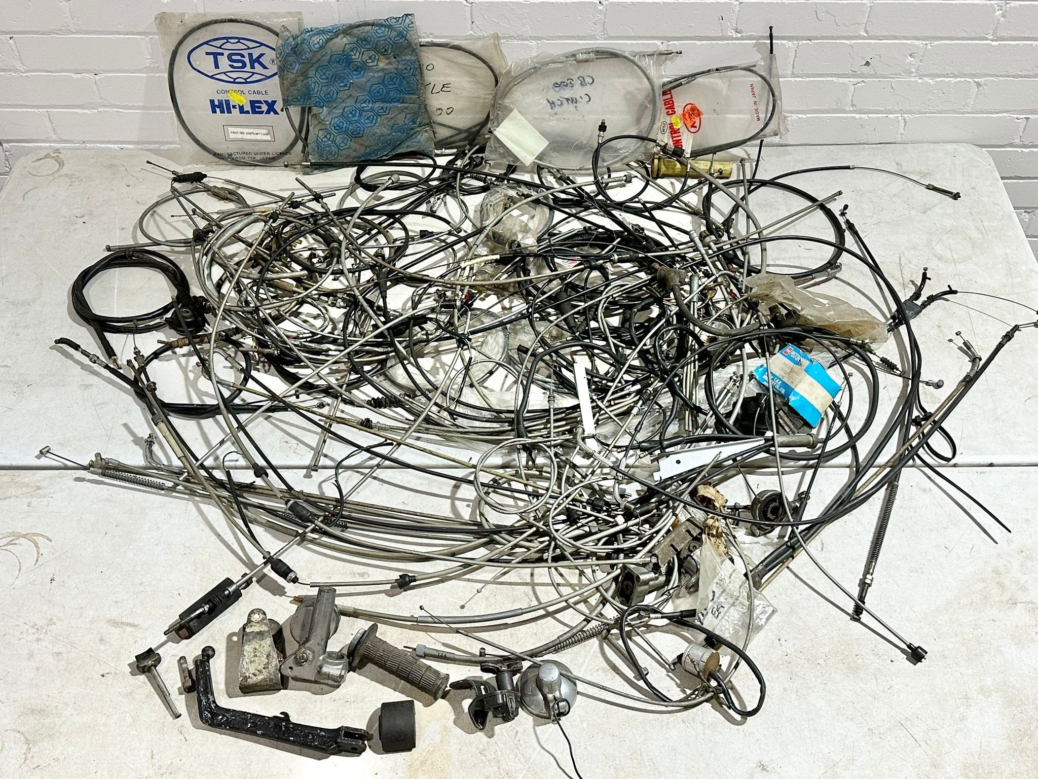 A quantity of various motorbike cables