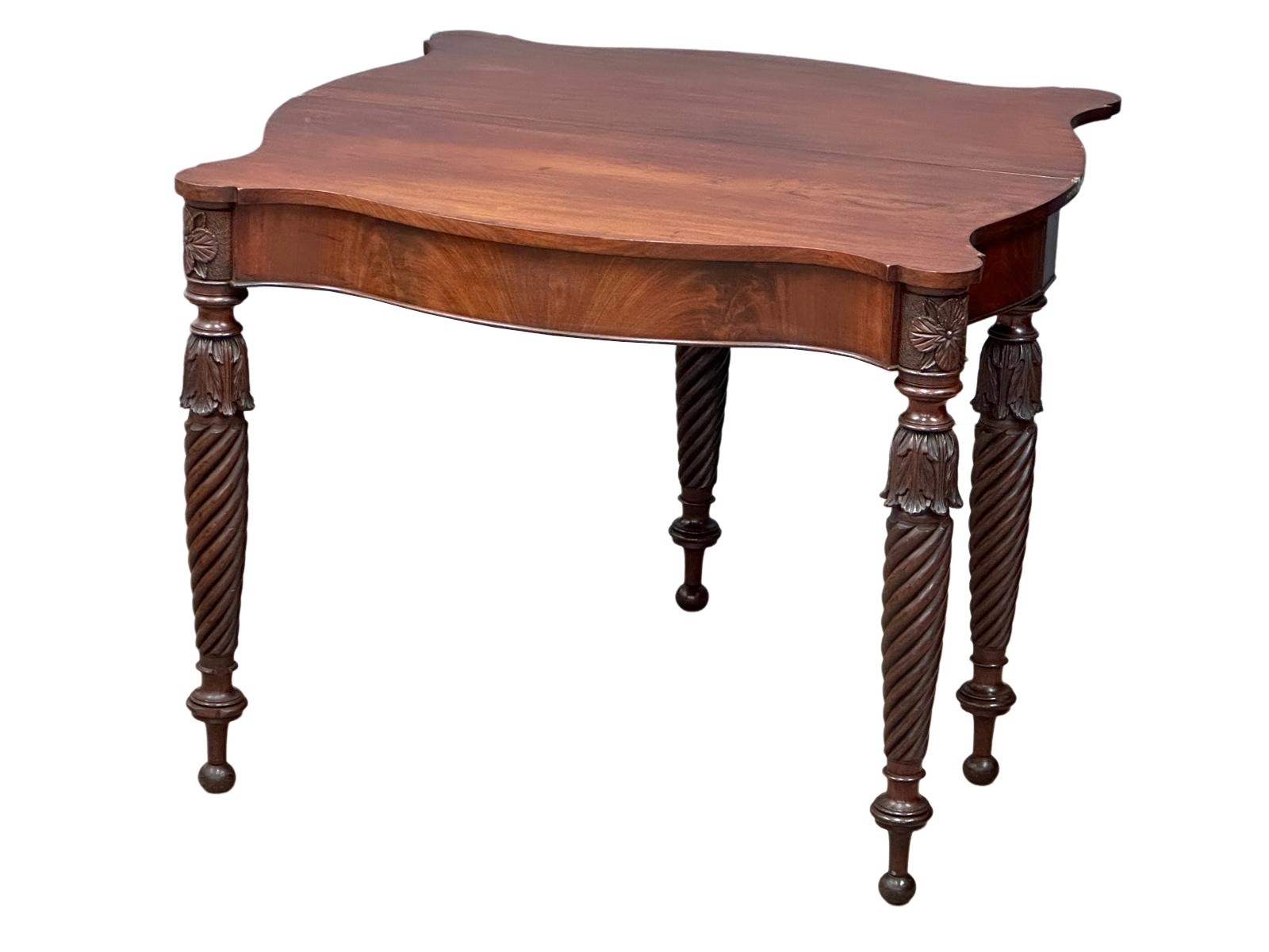 A William IV mahogany serpentine front turnover tea table on turned legs. Circa 1830. 87x44x75cm - Image 4 of 9