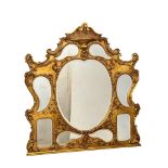 A large Early/Mid 19th Century Rococo gilt framed over-mantle mirror. 140x147cm