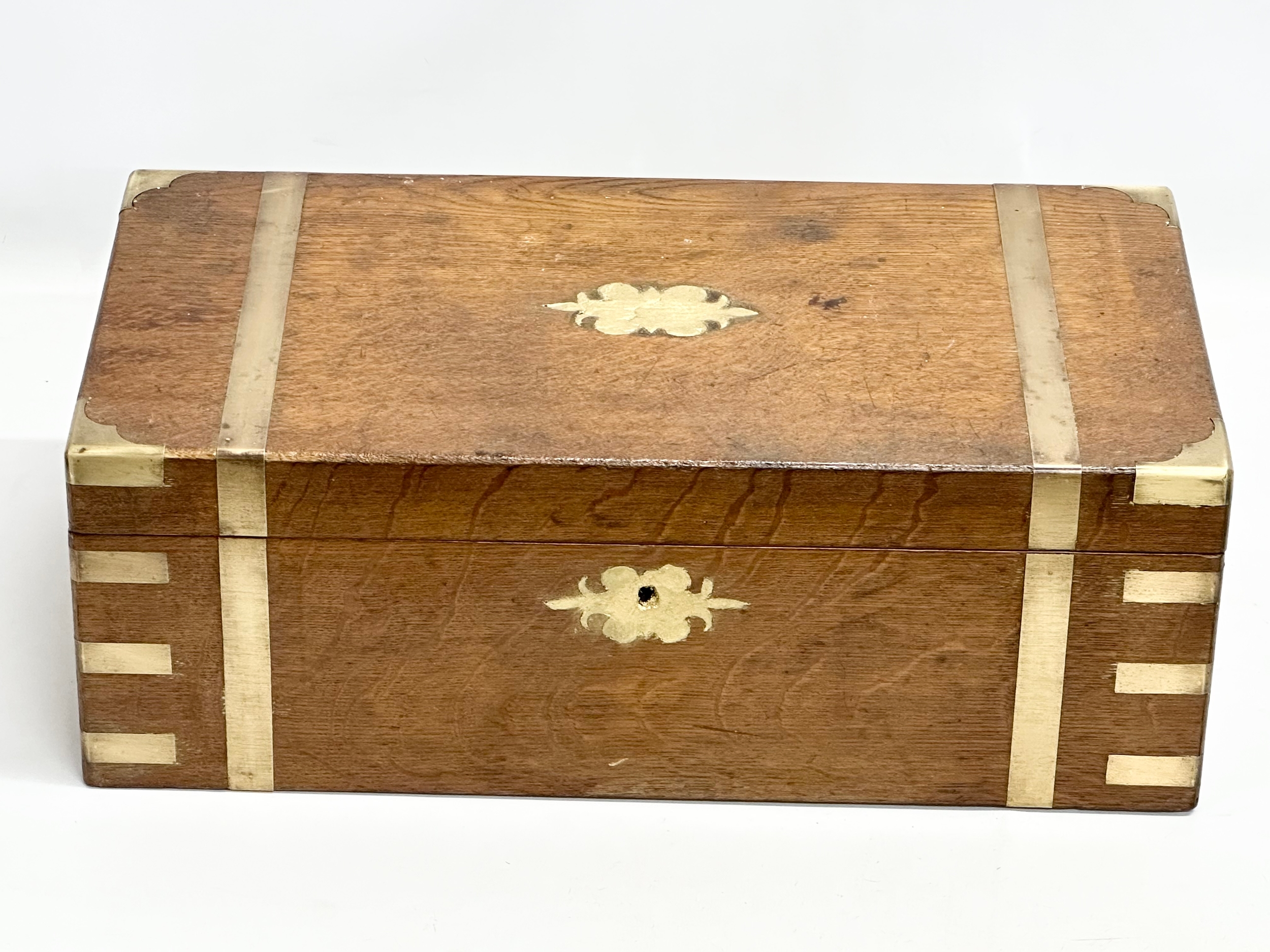A large Victorian brass bound writing slope. Closed 50x26x18cm - Image 3 of 7