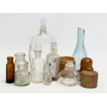 A collection of Late 19th and Early 20th Century glass bottles etc. largest 18cm