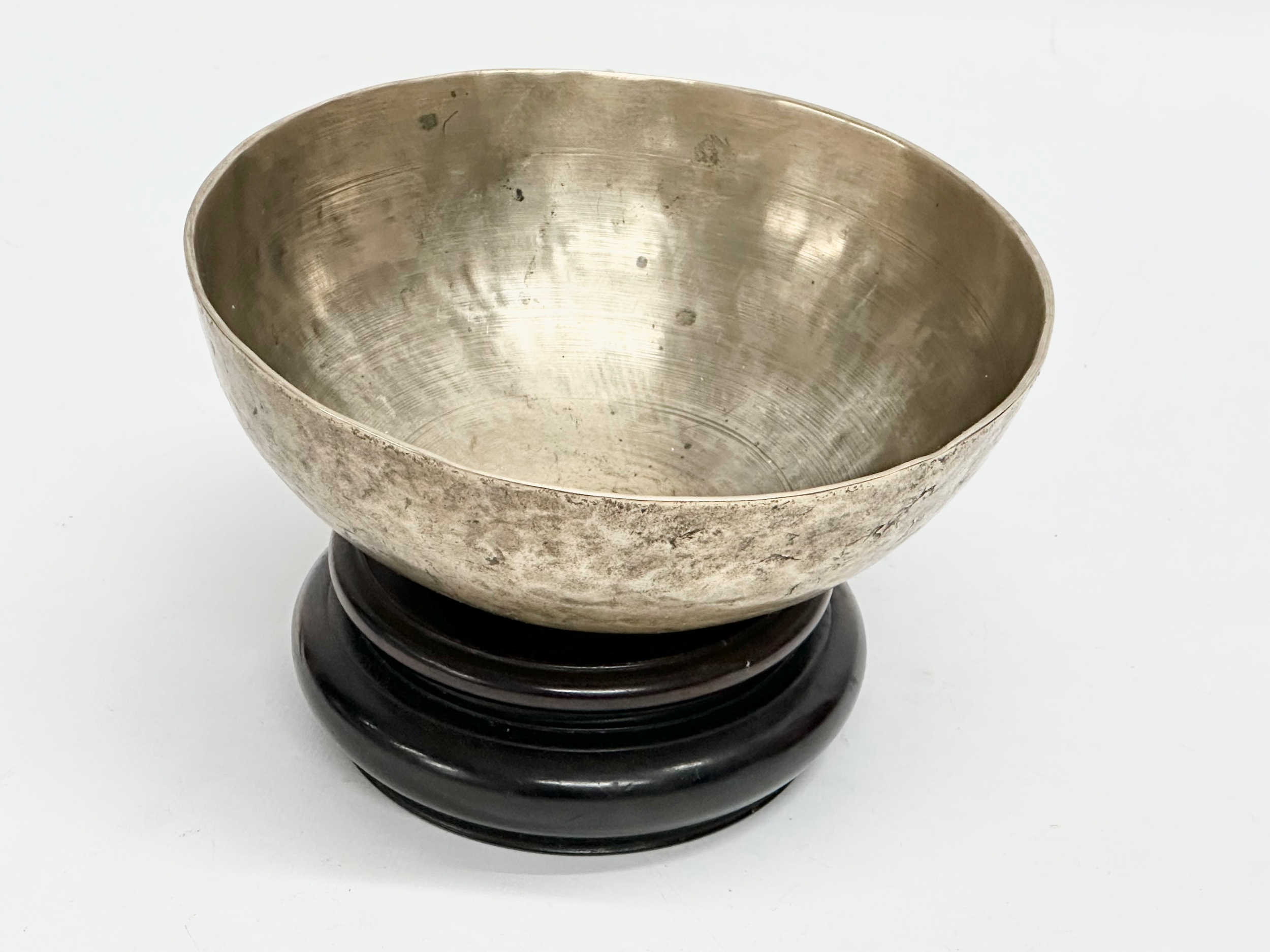 A Late 19th Century Tibetan Singing bowl on stand. Bowl measures 16x6cm - Image 2 of 5