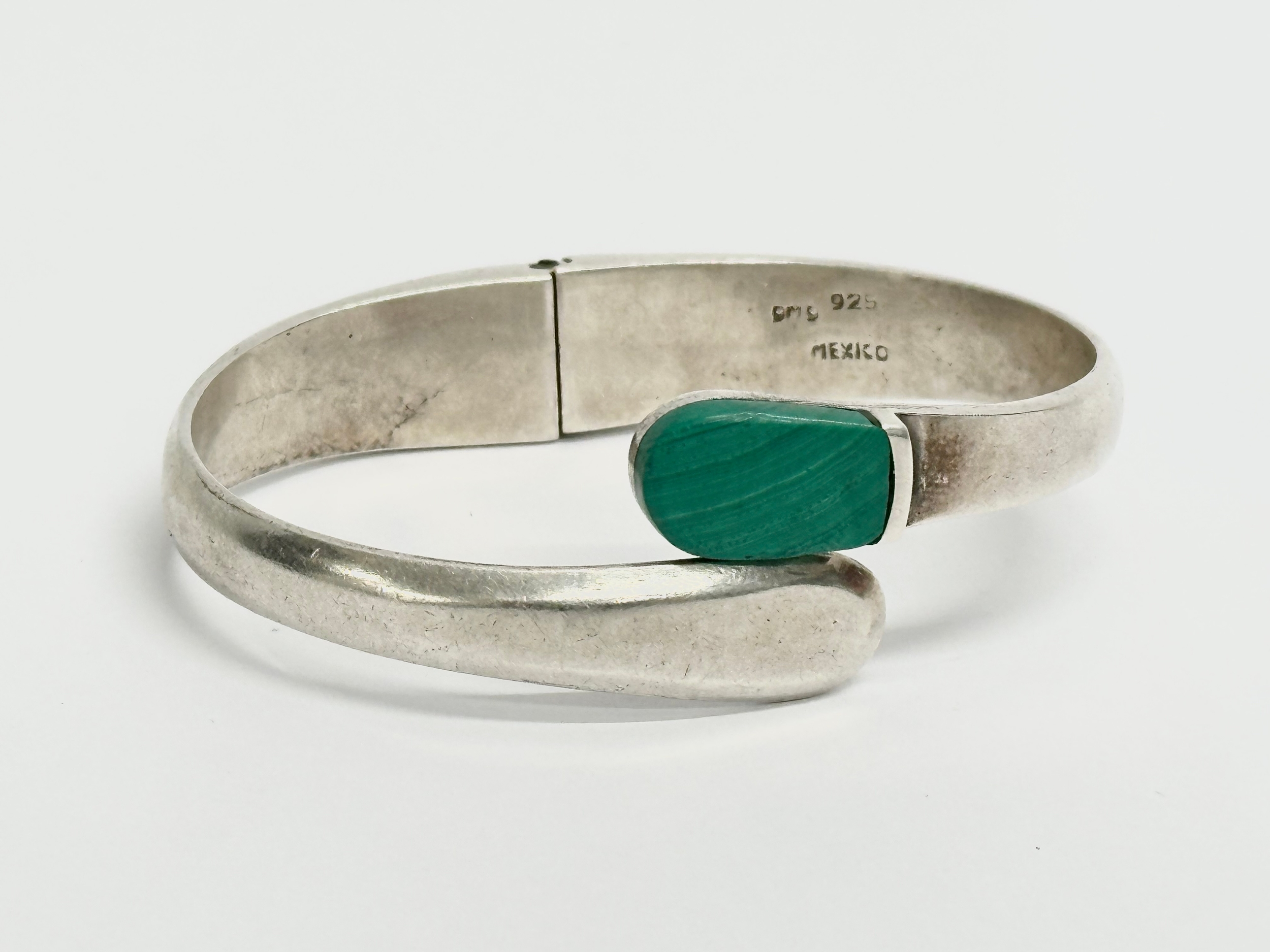 A 925 silver bangle. 44.41 grams.