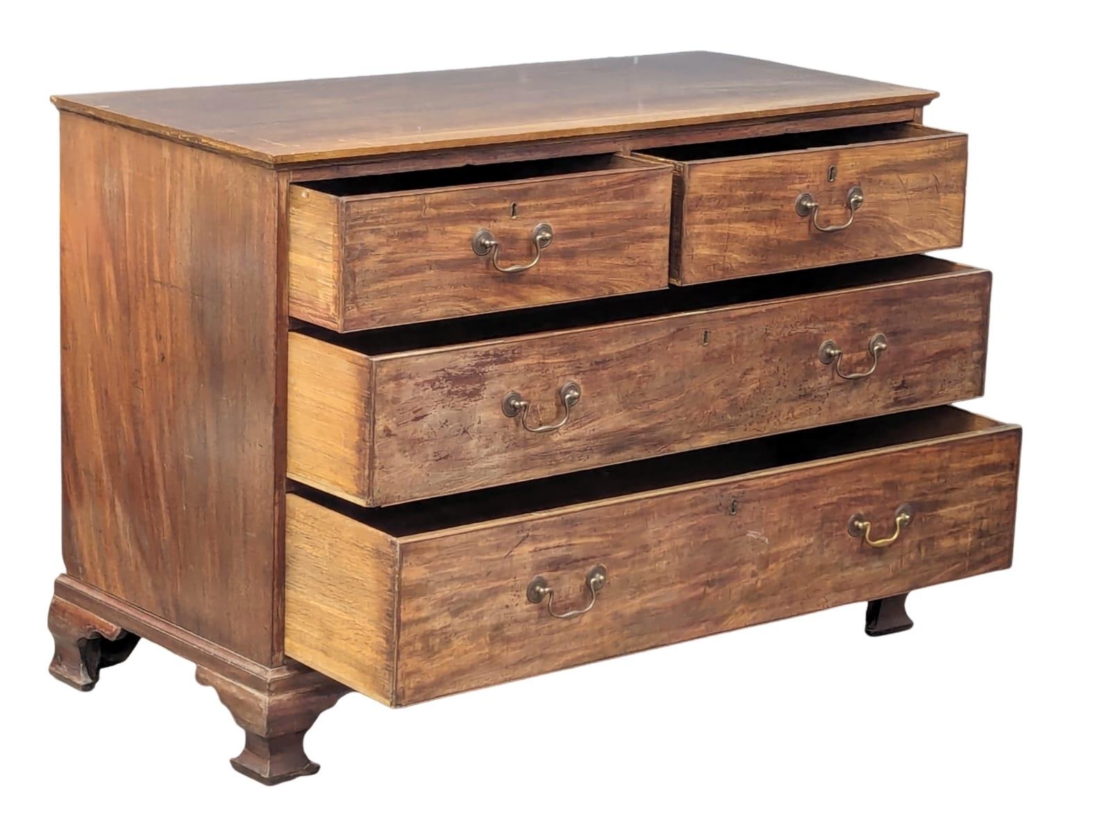 A George III mahogany oak lined chest of drawers on ogee feet and original brass drop handles. Circa - Image 2 of 5