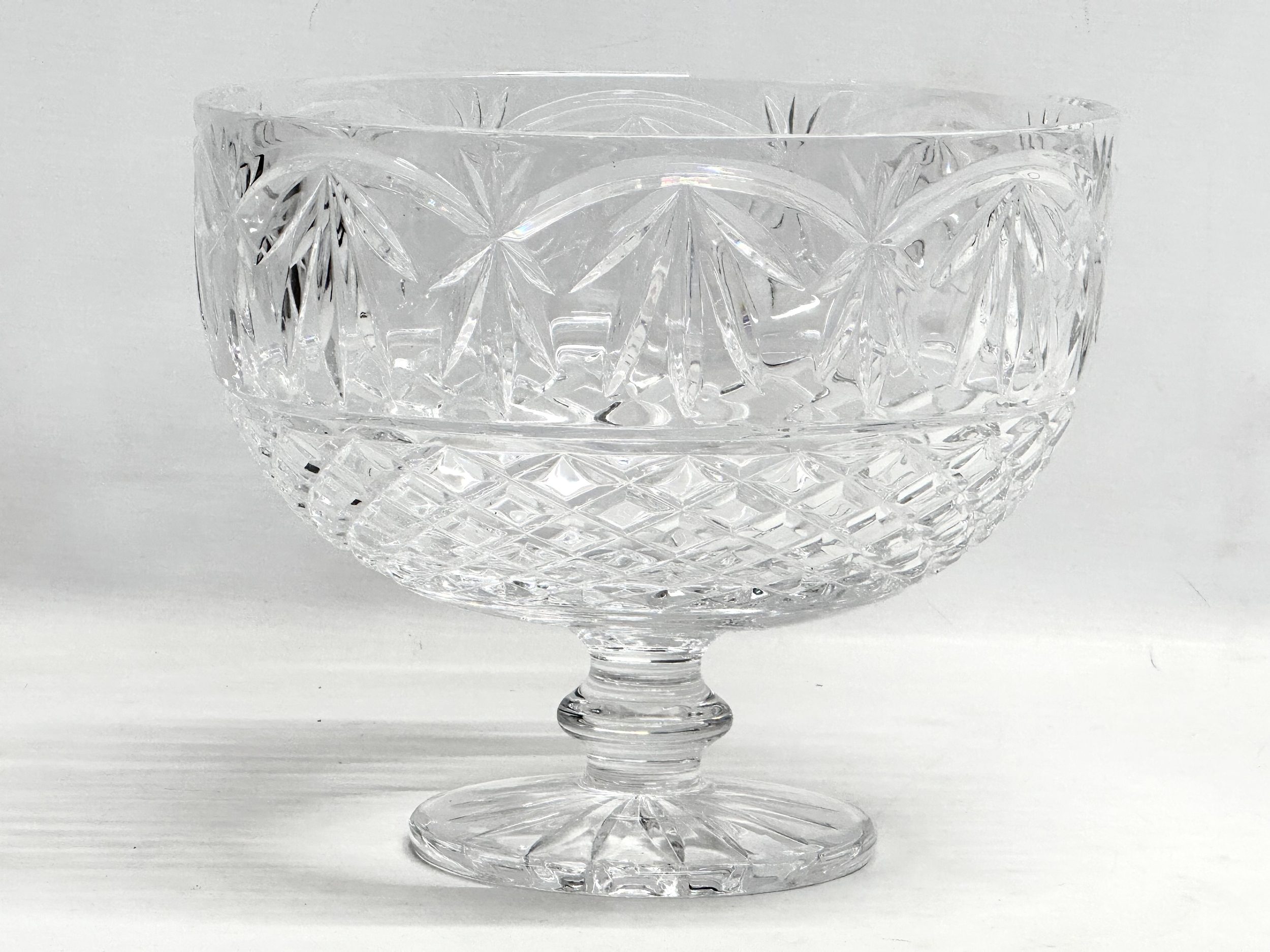 A large Tyrone Crystal footed centre piece bowl. 24.5x20.5cm.