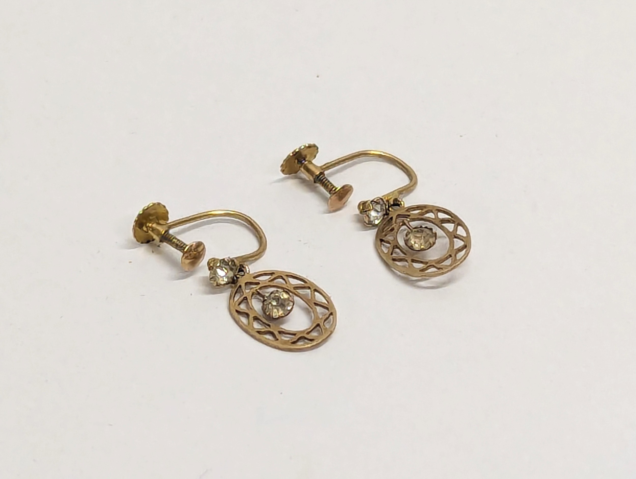 A pair of 9ct gold earrings. 1.22g