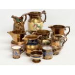 A collection of Victorian lustre jugs.