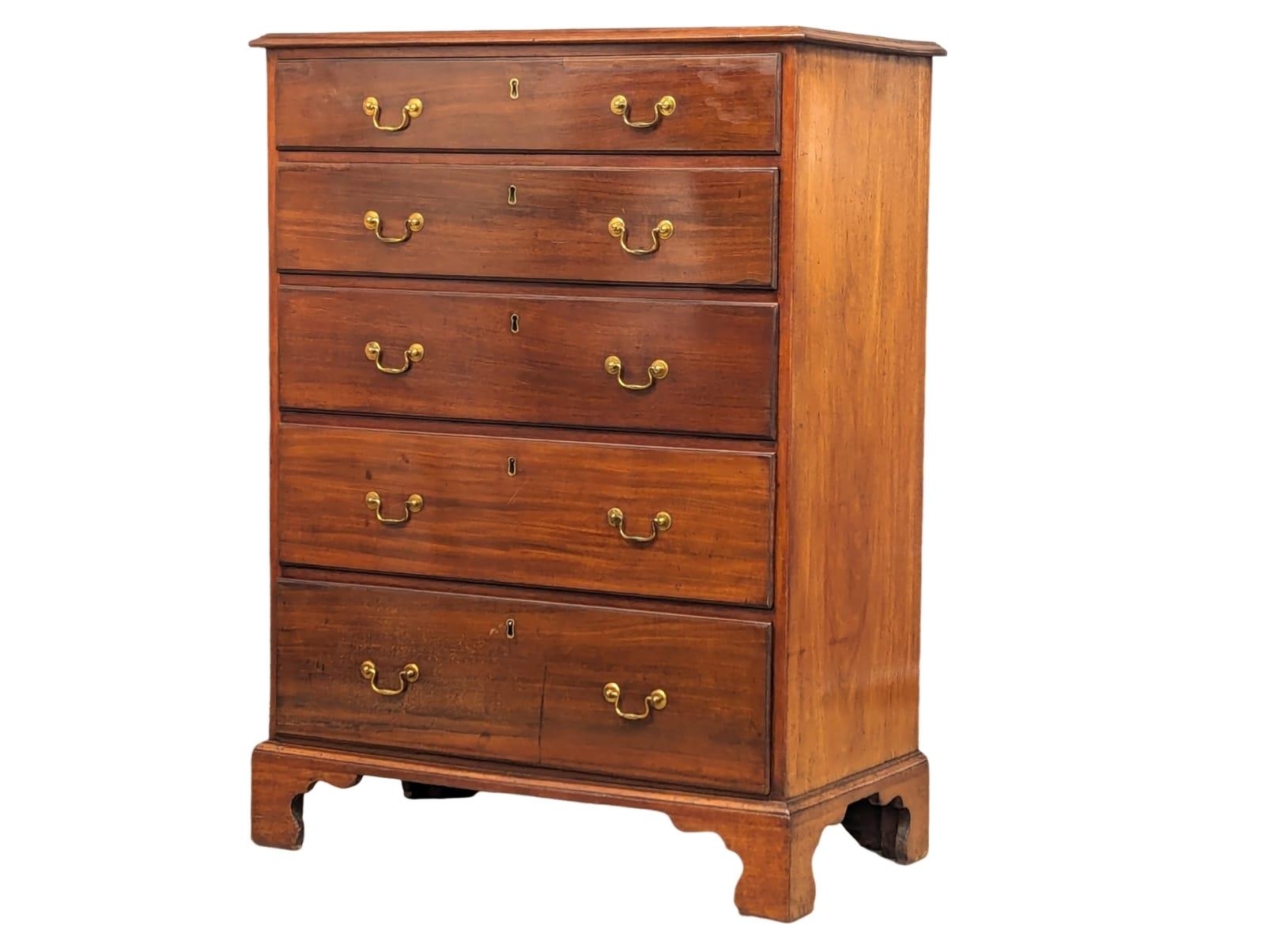 A tall good quality George III 18th Century mahogany chest of drawers on bracket feet, circa 1760-