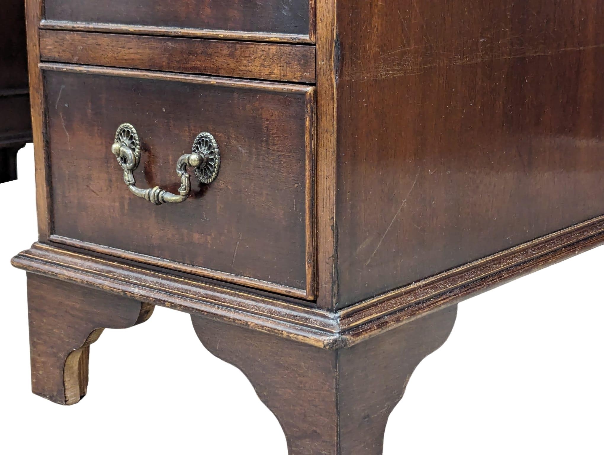 A George III style mahogany leather top desk, 118cm x 60cm x 77cm - Image 6 of 8