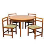 A Mid Century teak dining table with a set of 4 Mid Century dining chairs. 120x73cm