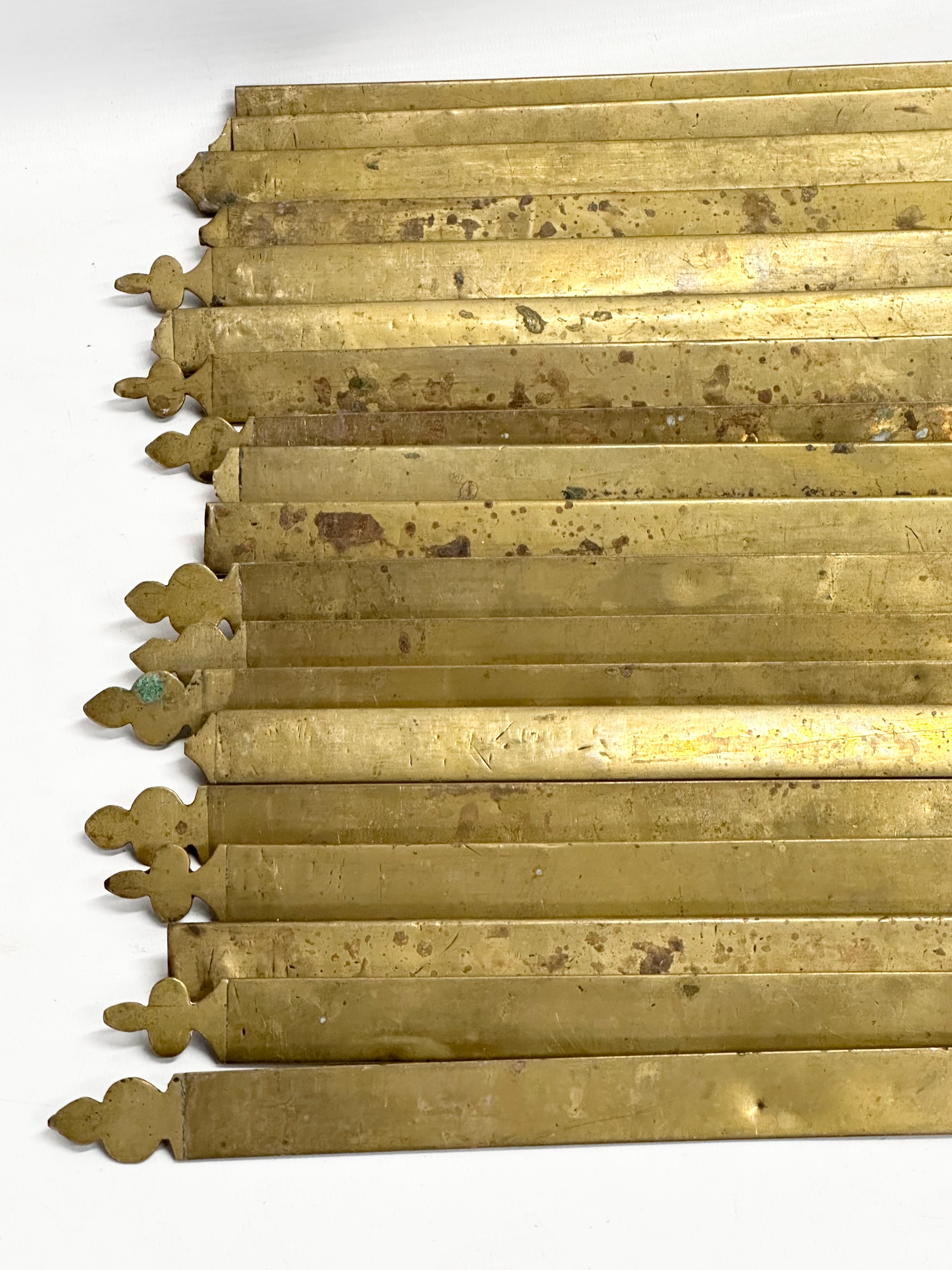 A quantity of Late 19th/Early 20th Century brass stair rods. 81cm - Image 4 of 4