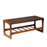 A Mid Century teak and glass top coffee table. 106.5x47.5x43cm