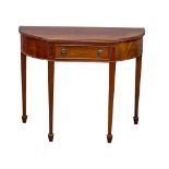 A Hepplewhite style mahogany serpentine front side table with drawer. 95.5x47.5x77cm