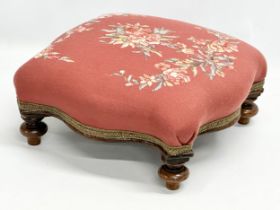A Victorian tapestry top footstool. 38x37x17cm