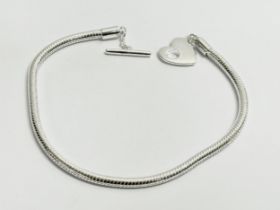 A silver bracelet. 20cm. 13.4 grams.