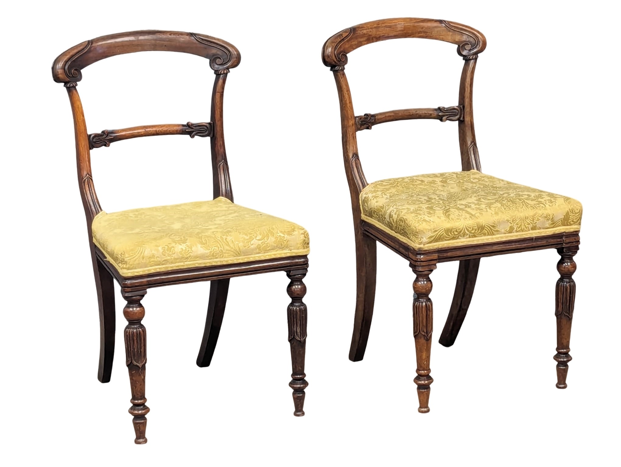 A pair of Victorian rosewood bar back side chairs.