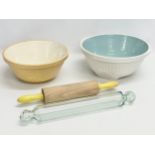 A collection of vintage kitchenware. 2 baking bowls, glass rolling pin and other.
