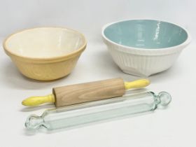 A collection of vintage kitchenware. 2 baking bowls, glass rolling pin and other.