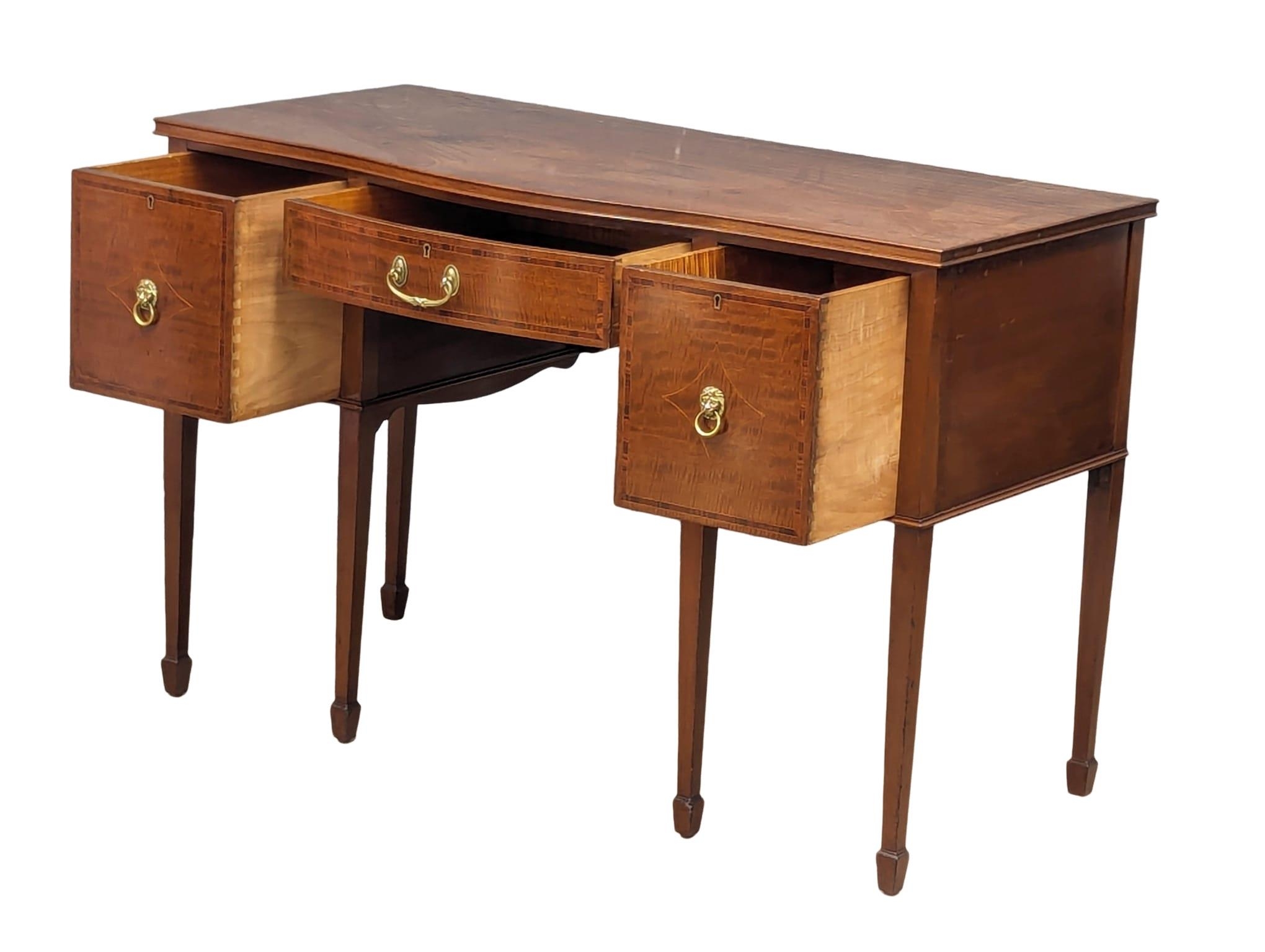 An Early 20th Century Sheraton Revival inlaid mahogany Serpentine front desk / side table. 122x57. - Image 5 of 5