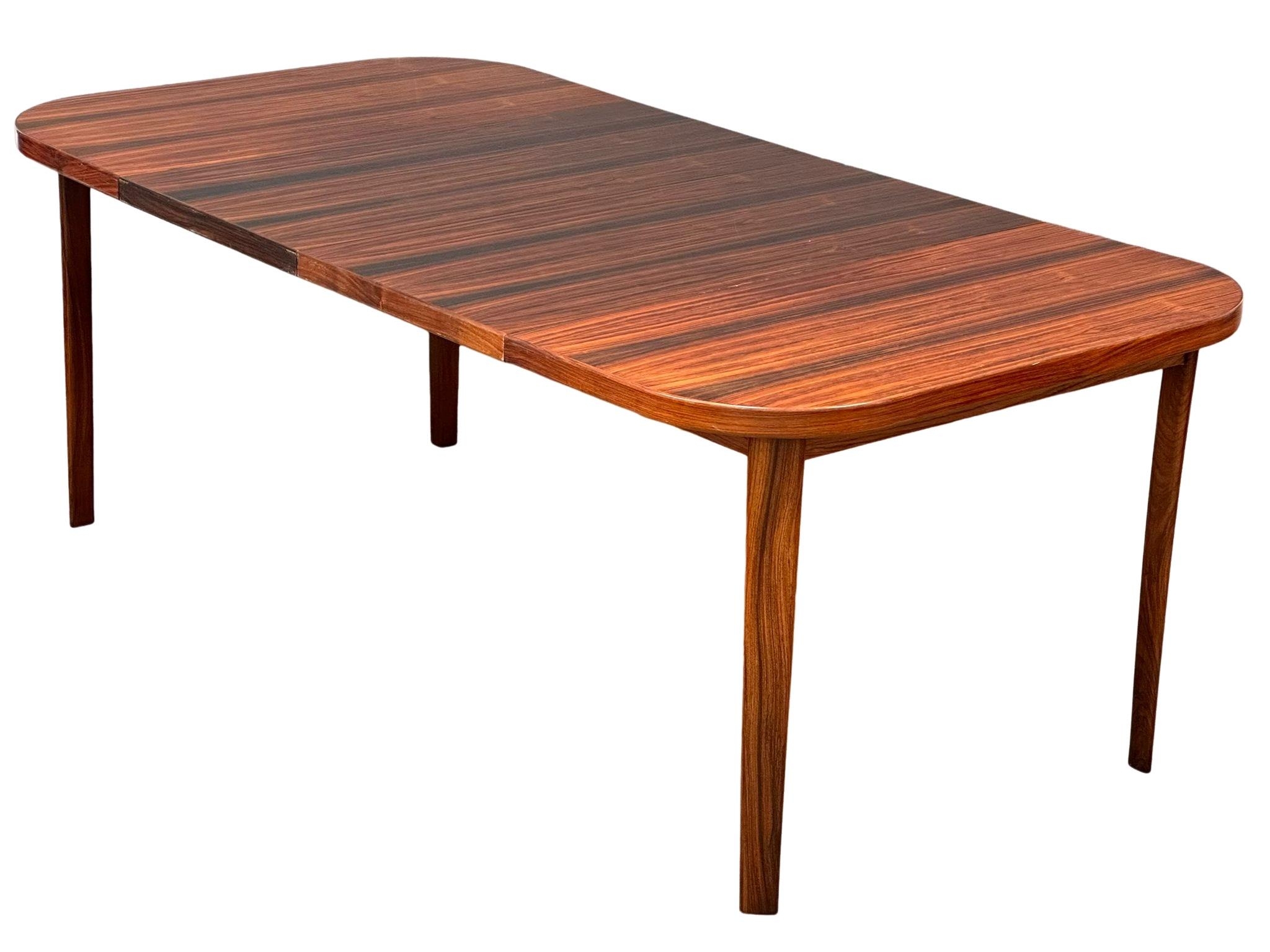 A Danish Mid Century rosewood extending dining table and 4 chairs. Closed 101x101x73cm. 1 leaf - Image 6 of 12