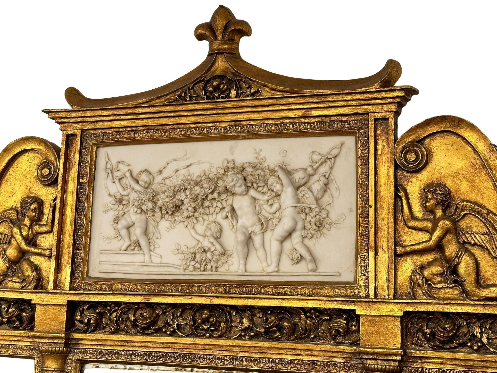 A very large 18th Century style French gilt mirror back console table with marble top, cherub and - Image 5 of 10