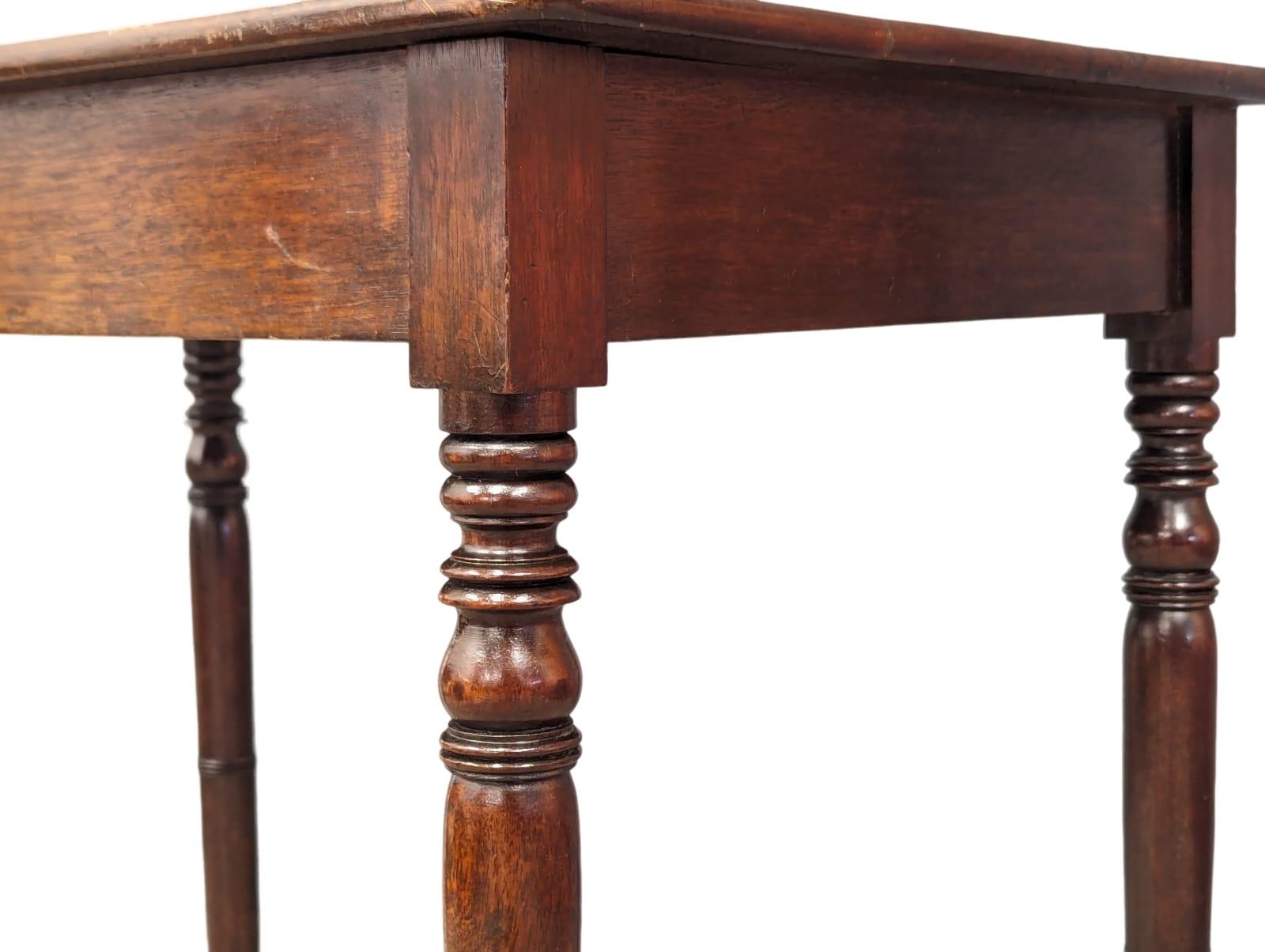 A William IV mahogany side table with turned supports and stretcher. Circa 1830-1835. 70x44x74cm - Image 4 of 4
