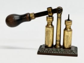 A 19th Century Capper and Decapper cartridge reloader.