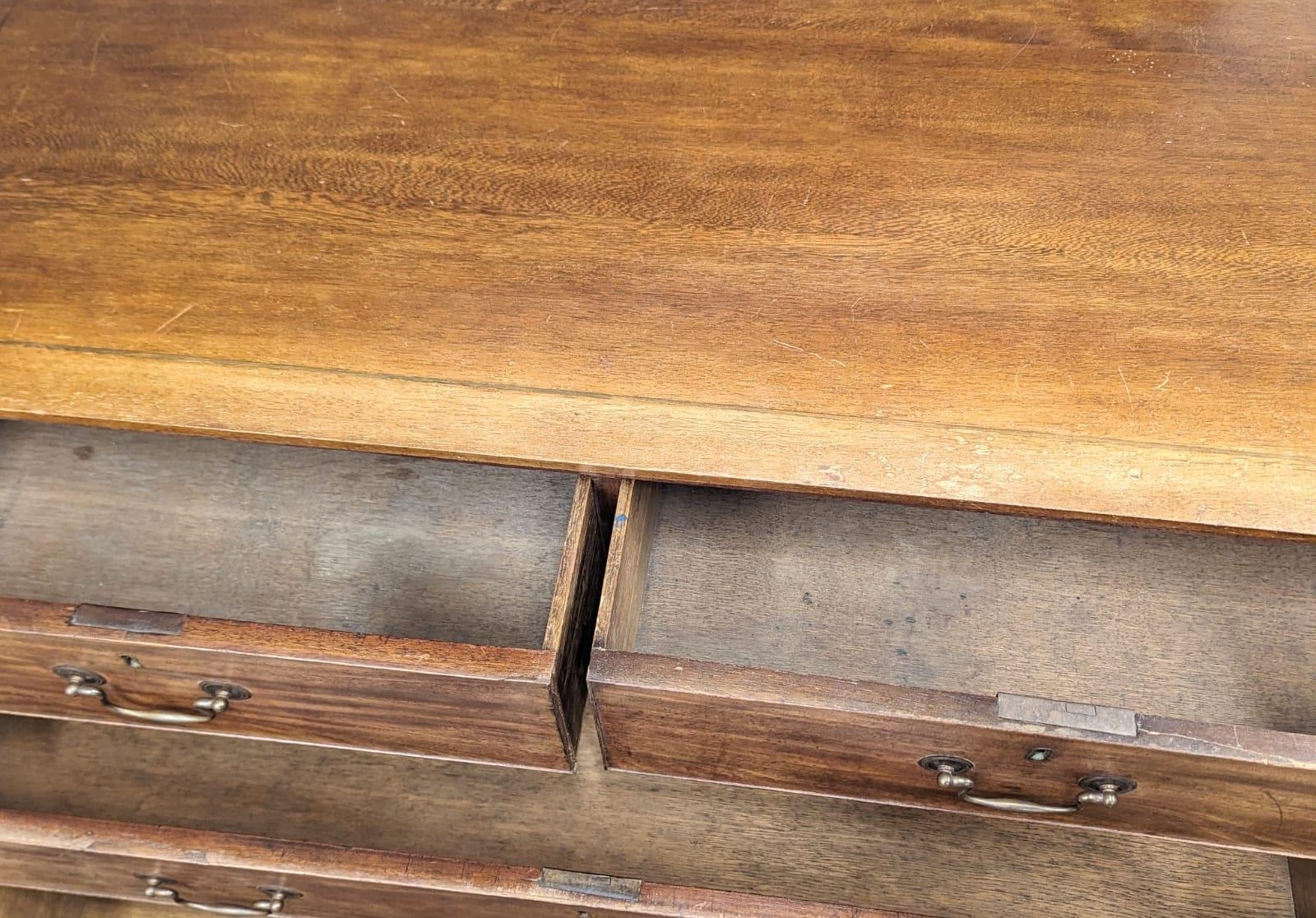 A George III mahogany oak lined chest of drawers on ogee feet and original brass drop handles. Circa - Image 5 of 5