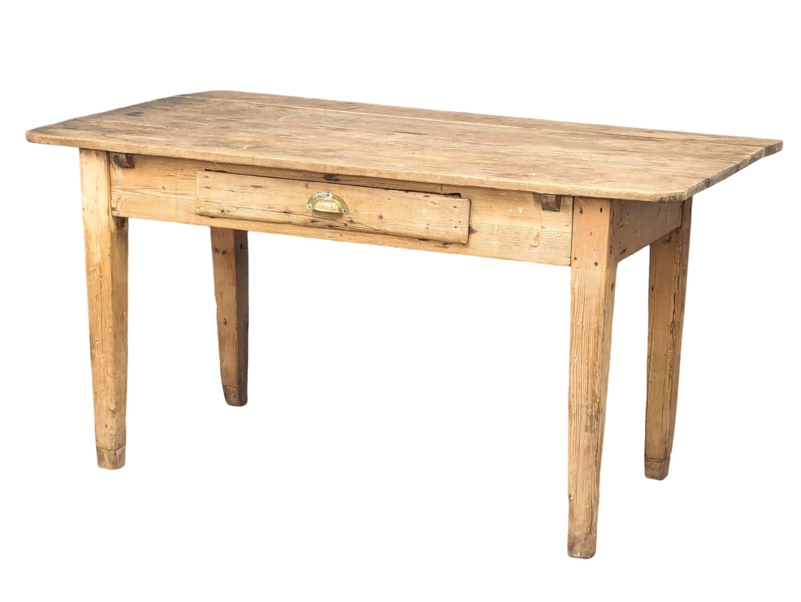 A 19th Century pine farmhouse table on square tapering legs with drawer and 1 drop-leaf, Circa - Bild 3 aus 9