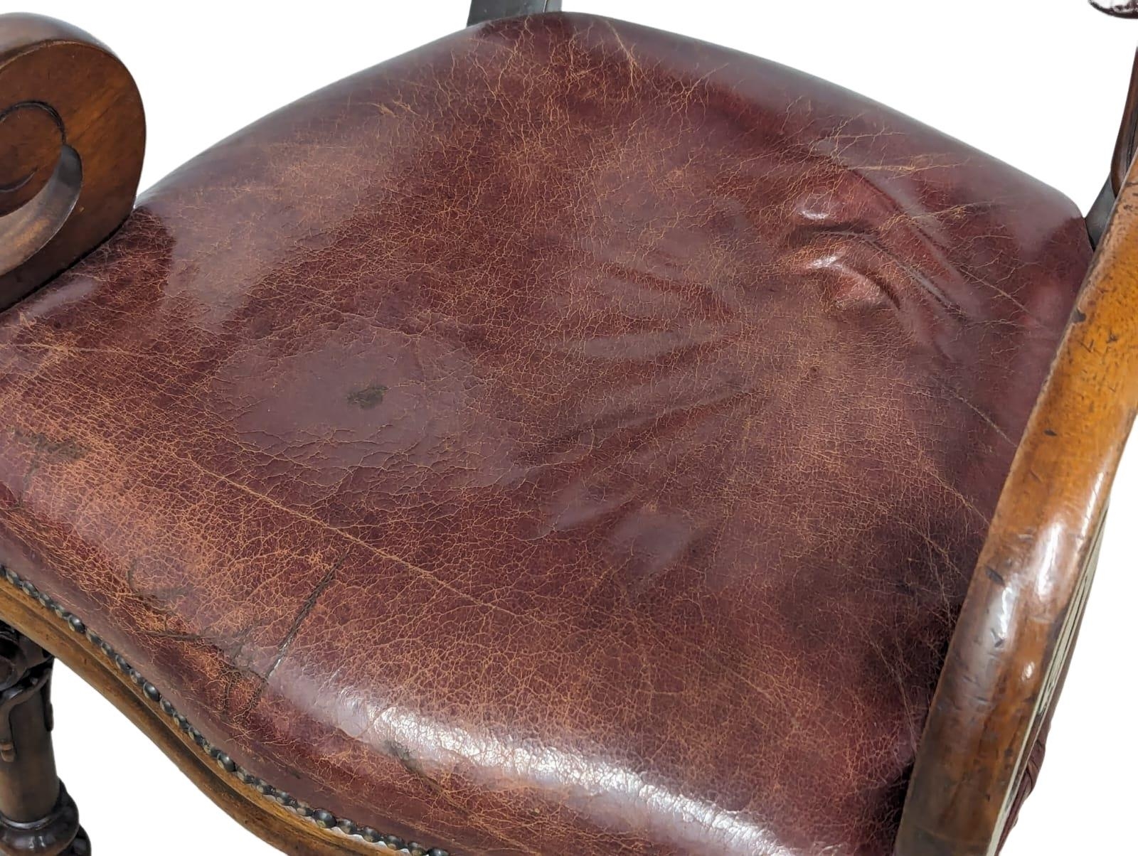 A William IV style mahogany armchair with scroll arms and leather seat - Image 5 of 8