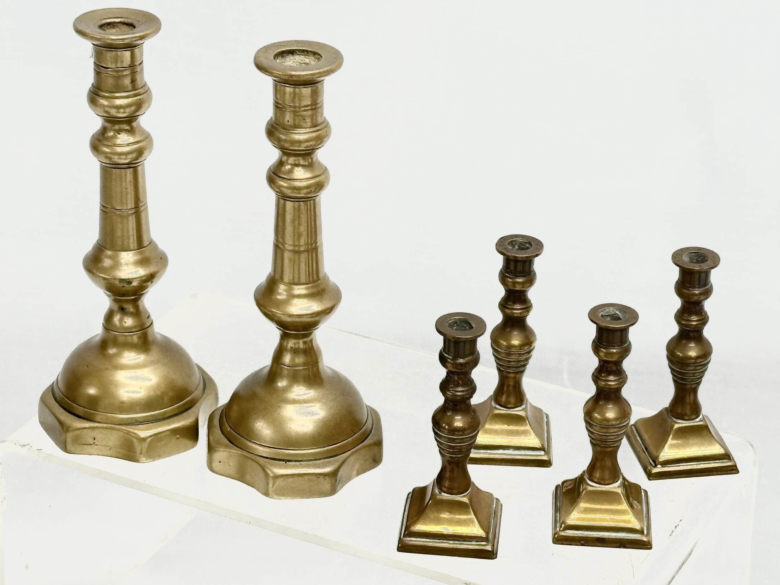 5 sets of Victorian brass candlesticks. 3 pairs and 2 sets of 4. 12cm, 11cm, 11.5. 6cm - Image 5 of 5