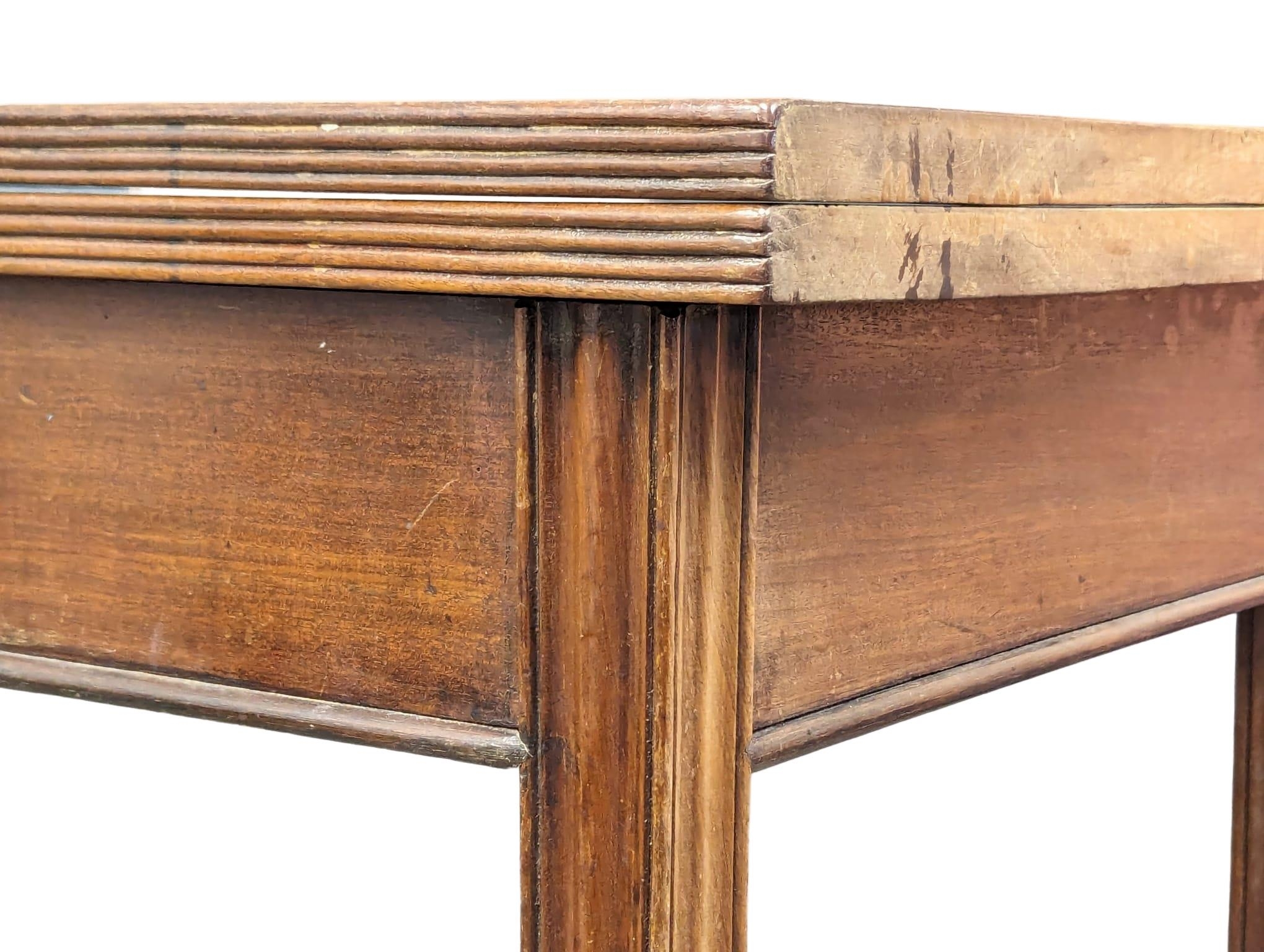 A George III mahogany tea table with drawer and square tapering legs, 109cm x 52.5cm x 76cm - Image 3 of 6