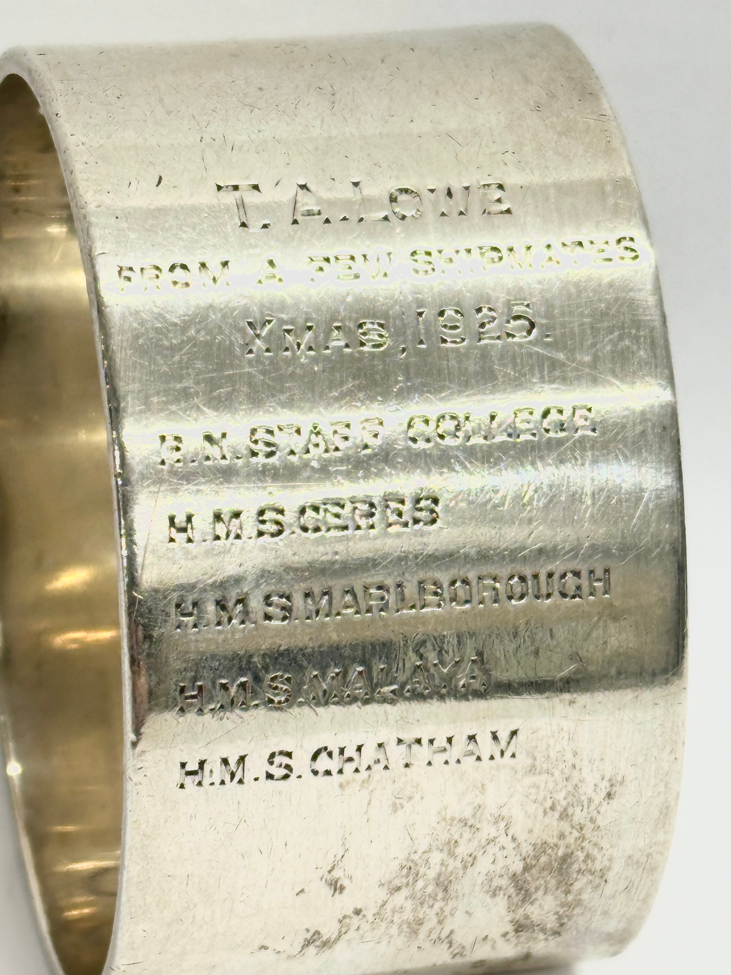 A Navy themed silver napkin ring. From a few shipmates, Xmas 1925. R.N. Staff College, H.M.S - Image 2 of 3