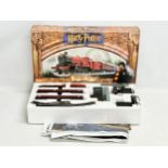 A Hornby Harry Pottery ‘Hogwarts Express’ electric train set.