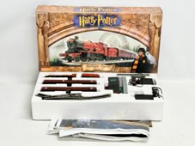 A Hornby Harry Pottery ‘Hogwarts Express’ electric train set.