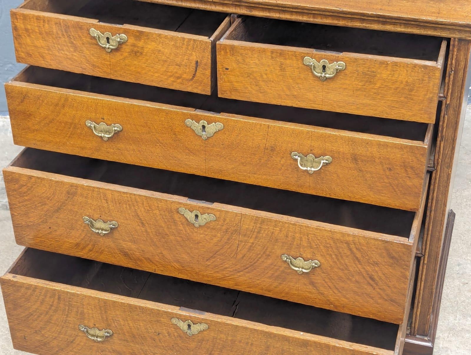 A George II oak chest of drawers with original handles and bracket feet, 94.5cm x 54.5cm x 94.5cm - Image 7 of 8