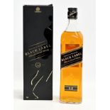 A bottle of Johnnie Walker Black Label Blended Scotch Whisky with box. 70cl