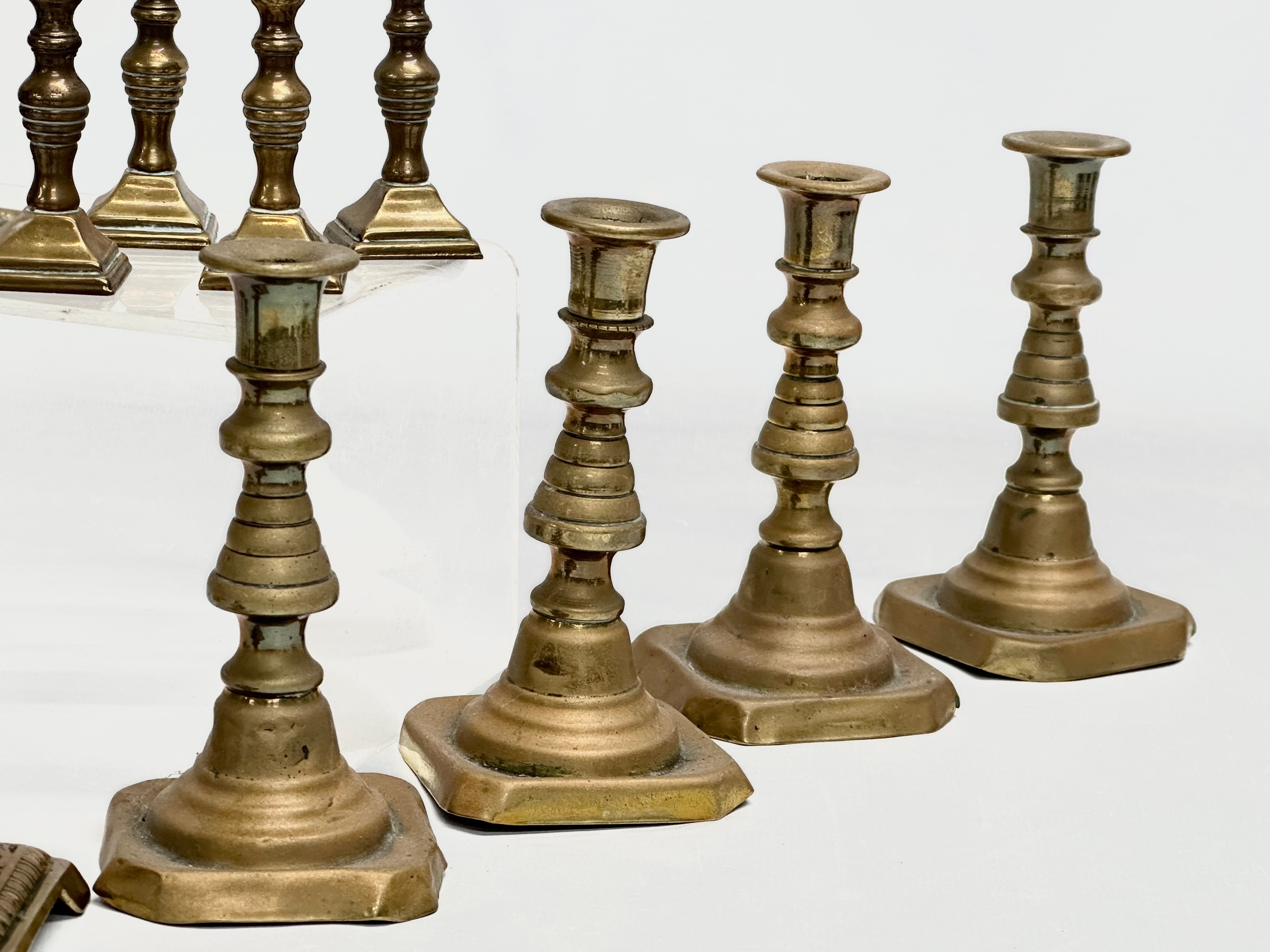 5 sets of Victorian brass candlesticks. 3 pairs and 2 sets of 4. 12cm, 11cm, 11.5. 6cm - Image 2 of 5