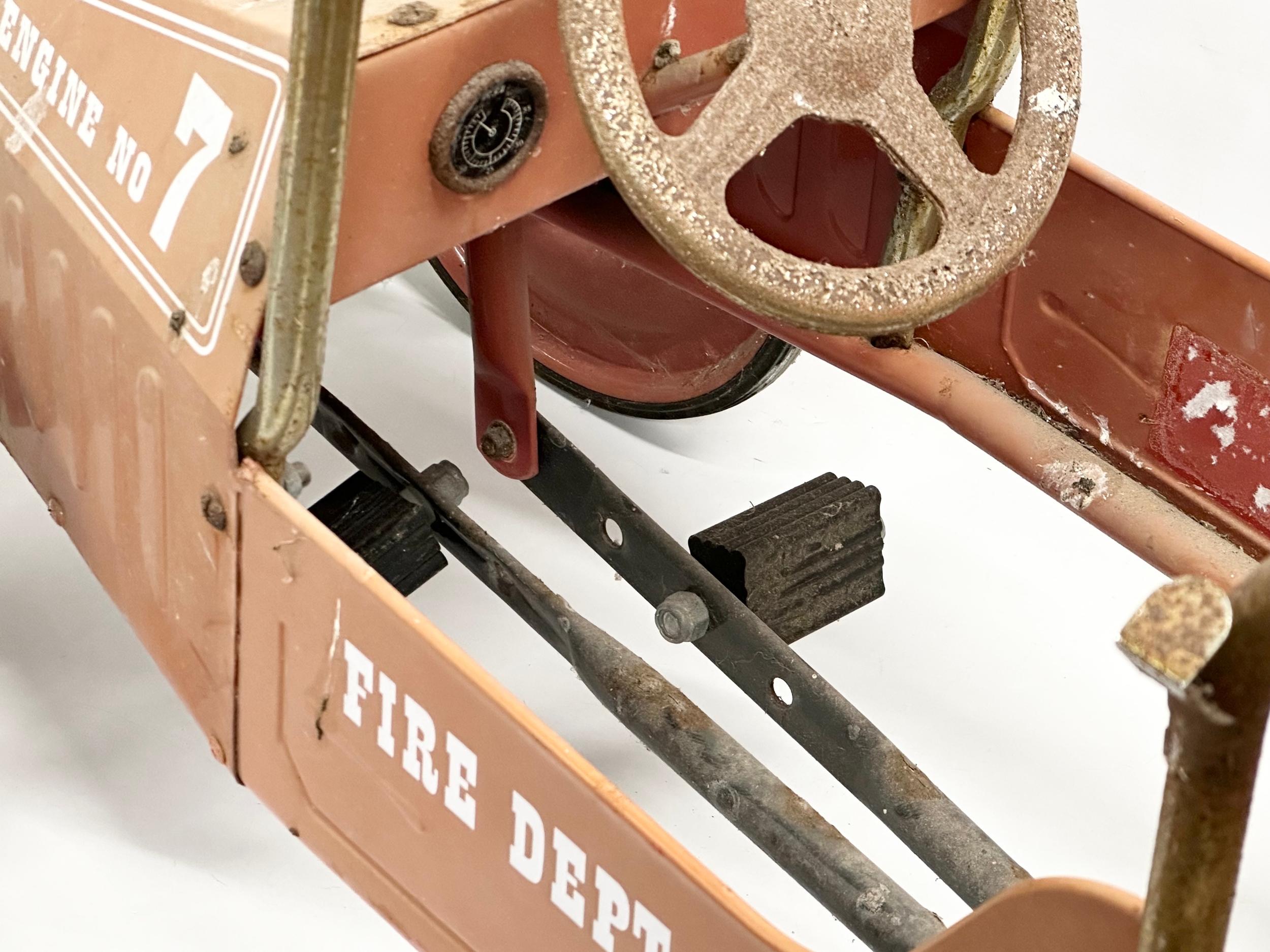 A child’s tin plate fire truck peddle car. 97cm - Image 6 of 6