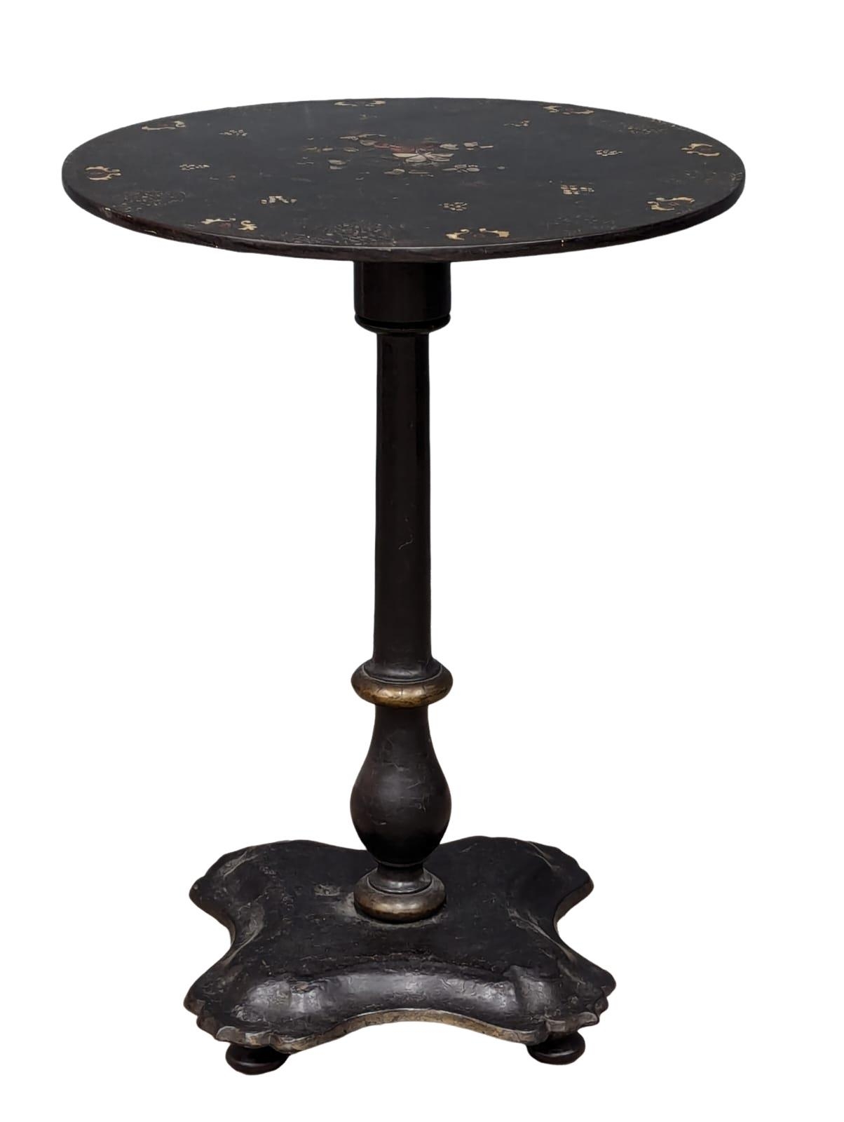 A Mid 19th Century lacquered pedestal table with Mother of Pearl inlay. 51x70cm