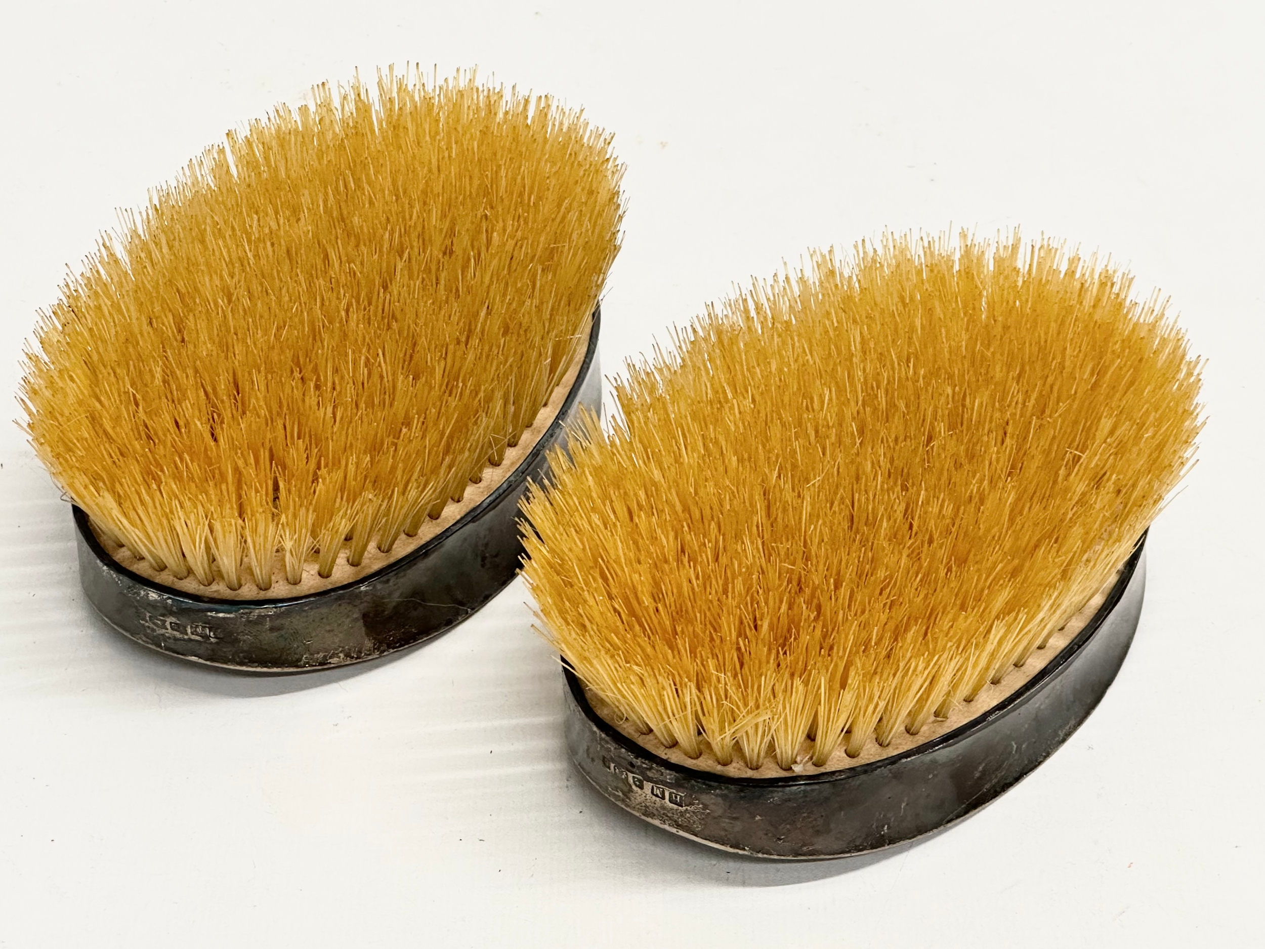 A pair of Late 19th Century Henry Matthews silver backed vanity brushes. Circa 1896. 14x9x6cm - Image 3 of 3