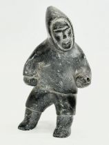 A soapstone Eskimo hunter. 12cm