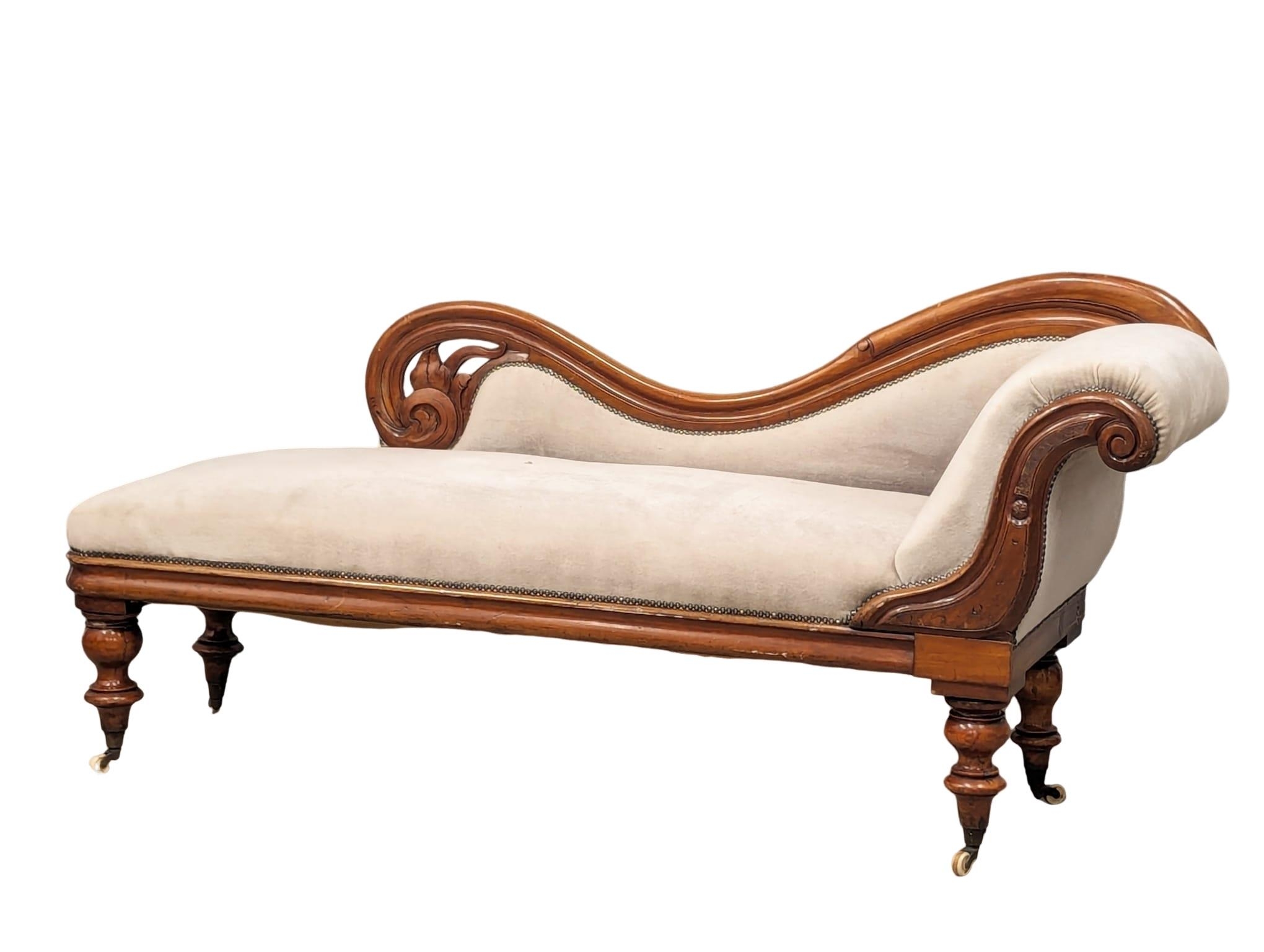 A Victorian mahogany framed chaise lounge. 188cm