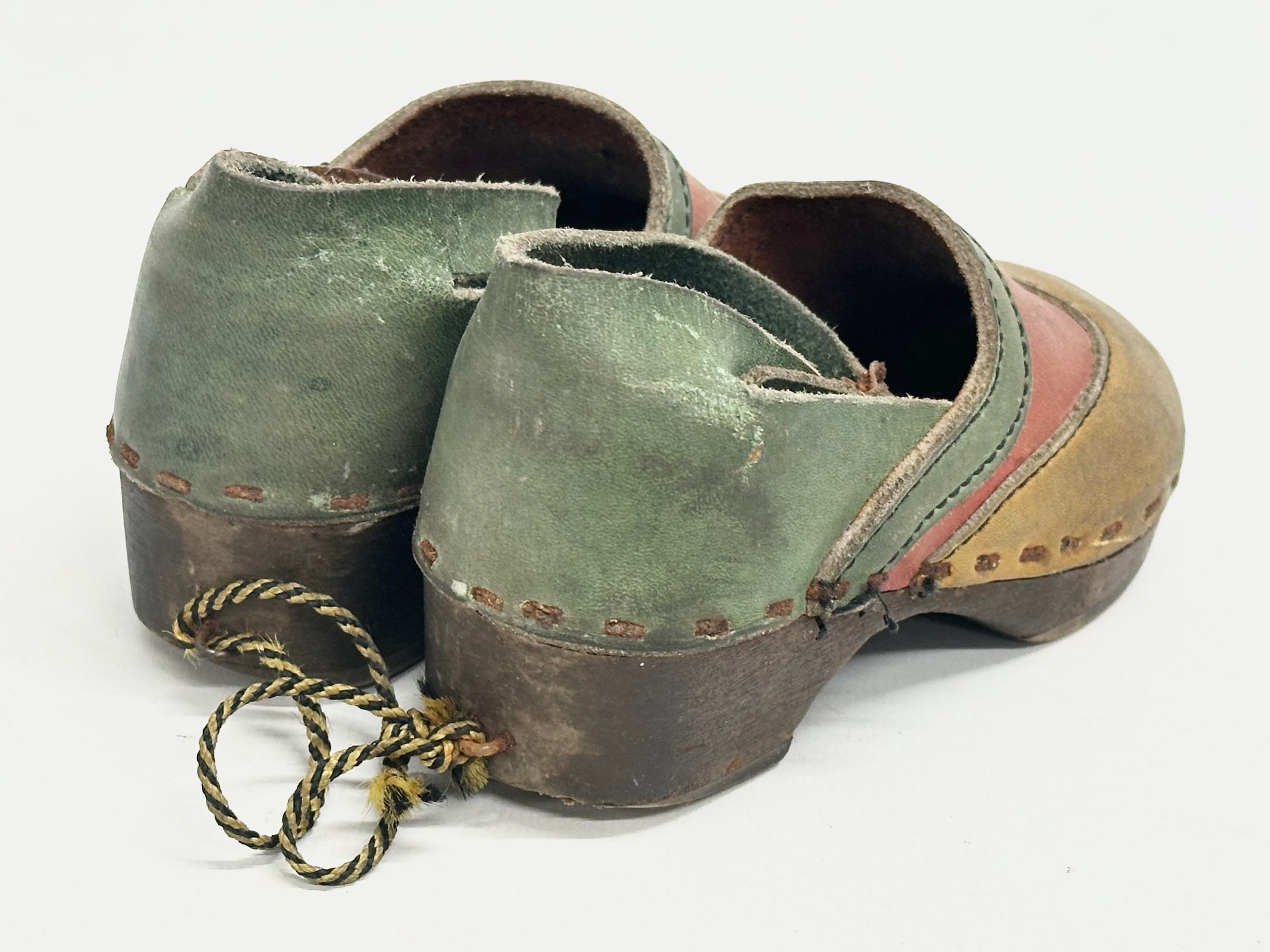 A pair of vintage child’s Folk Art leather and wooden clogs. - Image 3 of 4