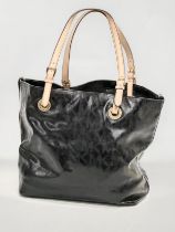 A Michael Kors patent leather tote bag.