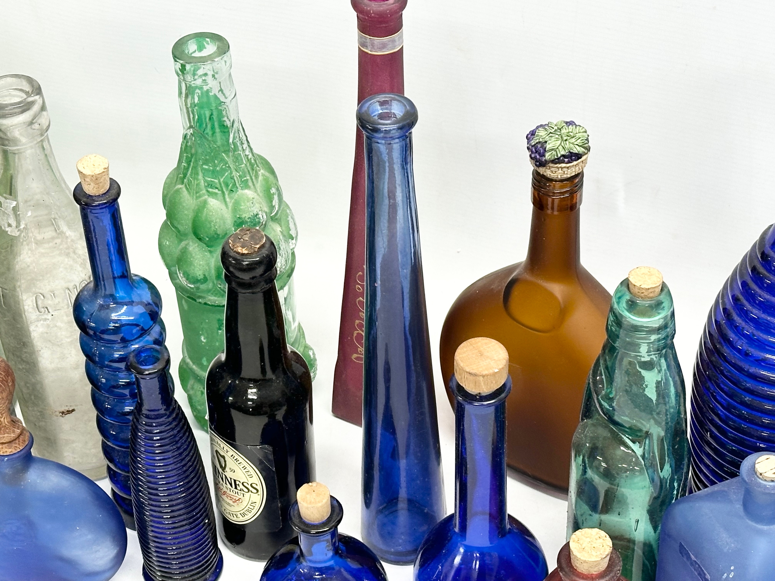 A collection of vintage glass bottles. Belfast water bottles, carboy etc - Image 7 of 7